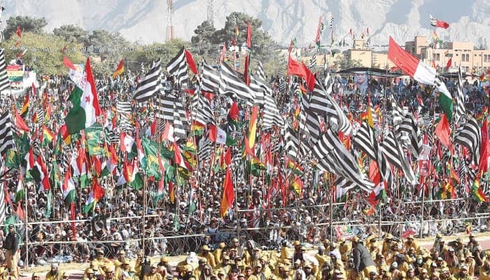 This file photo shows PDM supporters waving party flags at the Quetta rally in 2020. — AFP/File