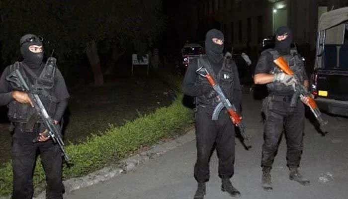 Masked CTD Balochistan officials stand alert with their weapons. Photo: File
