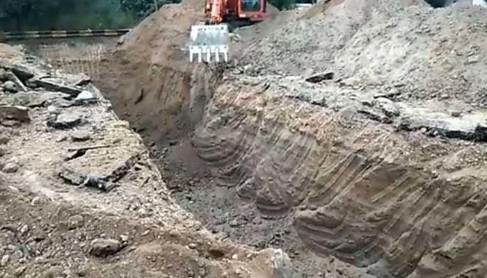 A view of the deep and long trench dug on GT Road near Gujranwala. — Geo News