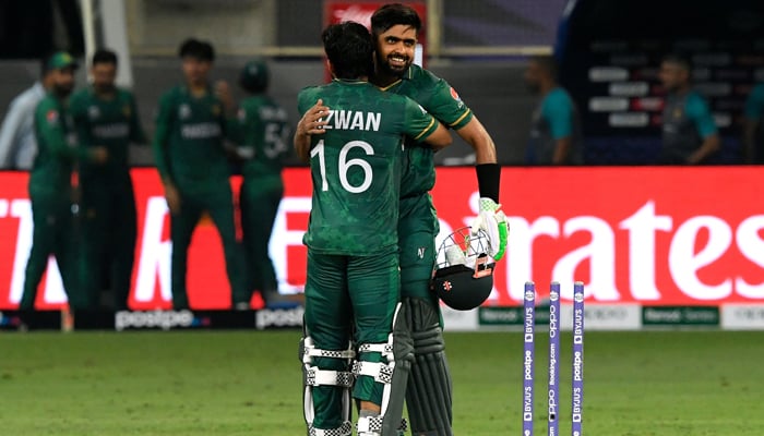 Pakistan´s captain Babar Azam (R) and his teammate Mohammad Rizwan celebrate their win in the ICC menâ€™s Twenty20 World Cup cricket match between India and Pakistan at the Dubai International Cricket Stadium in Dubai on October 24, 2021. — AFP