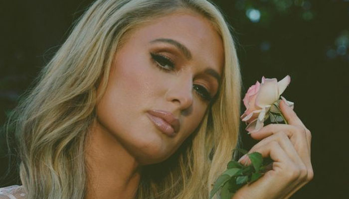 Paris Hilton creates tissue paper wedding dress in chic backyard brunch