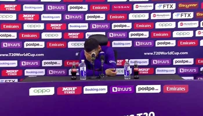 Virat Kohli holds his head in disbelief over reporters question. Photo: ICC Twitter video screengrab