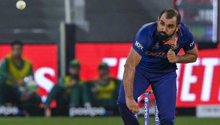 Indian fast bowler Mohammad Shami bowls during the Pakistan-India match. Photo: AFP