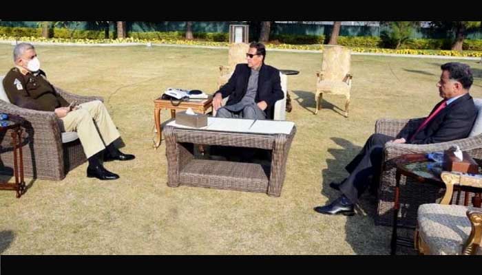 This file photo shows Prime Minister Imran Khan (C) in a meeting with Chief of Army Staff Gen Qamar Javed Bajwa (L) and  Director General of Inter-Services Intelligence (ISI) Lt Gen Faiz Hameed. — Geo News screengrab