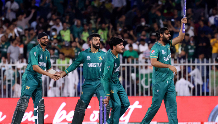 Pakistan´s players celebrate at the end of the ICC menâ€™s Twenty20 World Cup cricket match between Pakistan and New Zealand at the Sharjah Cricket Stadium in Sharjah on October 26, 2021. — AFP