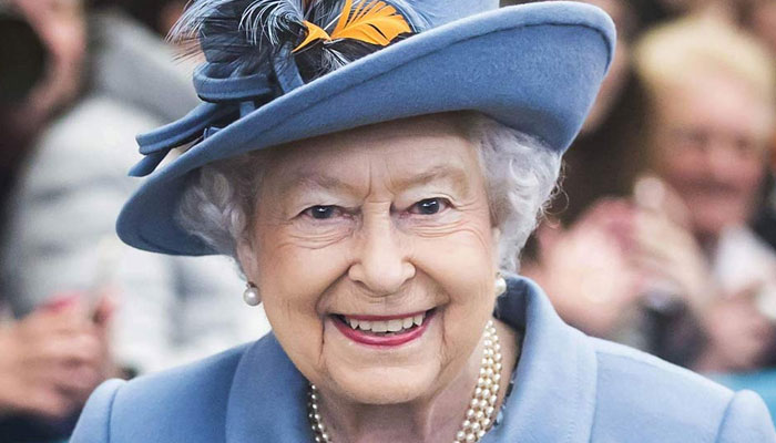 Queen Elizabeth looks in good spirit as she presents poetry award