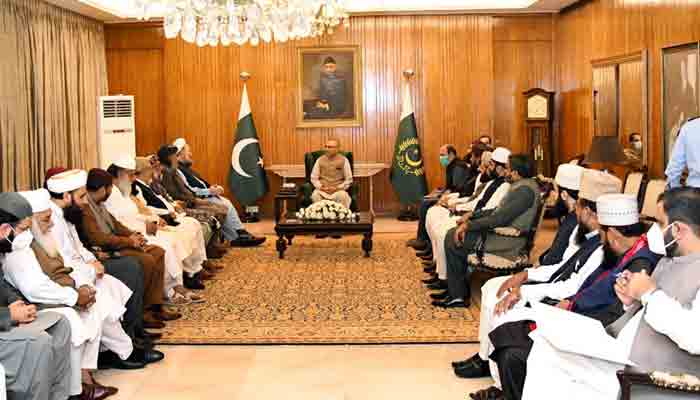 President Dr Arif Alvi in meeting with a delegation of Ulema of Ahle-e-Sunnat Wal Jamaat from different districts across the country. Radio Pakistan