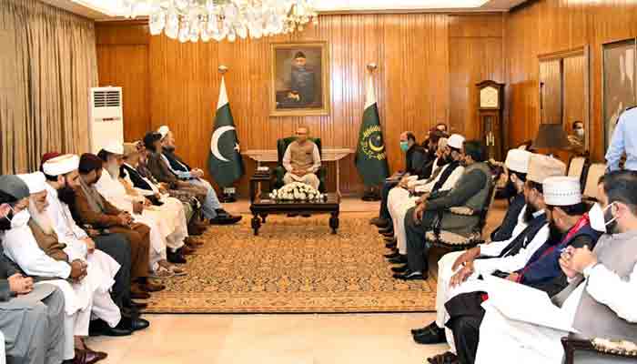 President Dr Arif Alvi in meeting witha delegation of Ulema of Ahle-e-Sunnat Wal Jamaat from different districts across the country. Radio Pakistan