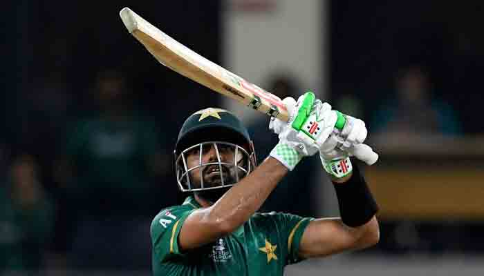 Pakistan´s captain Babar Azam plays a shot during the ICC mens Twenty20 World Cup cricket match between Afghanistan and Pakistan at the Dubai International Cricket Stadium in Dubai on October 29, 2021. -AFP