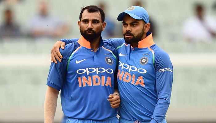 Indian pacer Mohammad Shami (L) and skipper Virat Kohli. — AFP/File