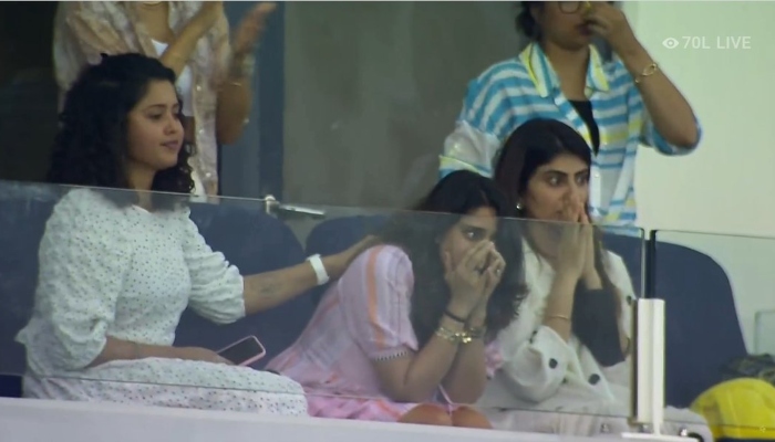 Rohit Sharmas wife Ritika (Centre) watches with baited breath as Milne drops him. Photo: Twitter