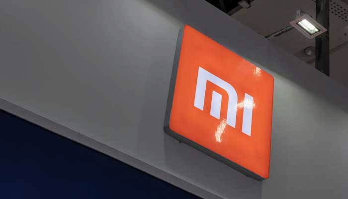 The logo of Xiaomi Corporation, a Chinese electronics company founded by Lei Jun in 2010 and headquartered in Beijing, is shown at an exhibition. Photo: AFP