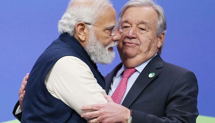 Indias PM Narendra Modi hugging United Nations Secretary-General Antonio Guterres at Cop26. Photo: AFP