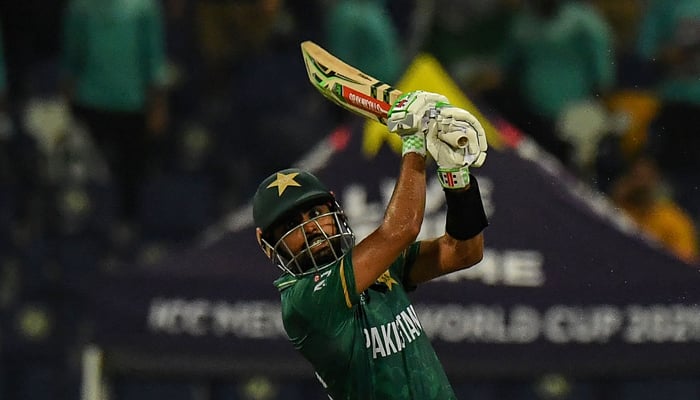 Pakistans captain Babar Azam plays a shot during the ICC Twenty20 World Cup cricket match between Namibia and Pakistan at the Sheikh Zayed Cricket Stadium in Abu Dhabi on November 2, 2021. — AFP