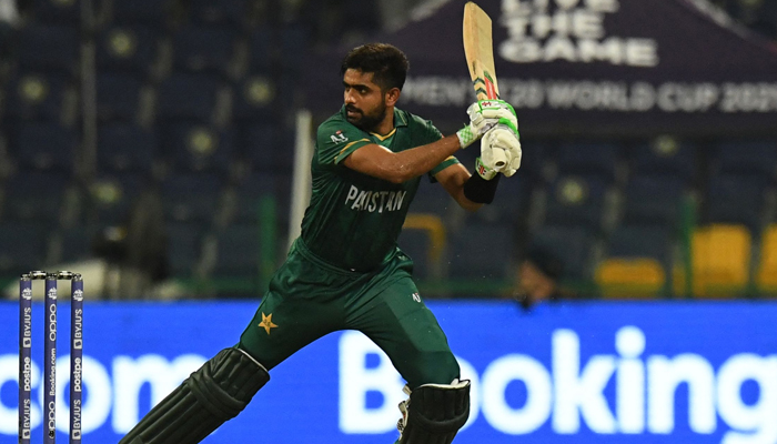 Pakistan´s captain Babar Azam plays a shot during the ICC Twenty20 World Cup cricket match between Namibia and Pakistan at the Sheikh Zayed Cricket Stadium in Abu Dhabi on November 2, 2021. — AFP