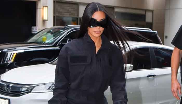 Kim Kardashian glams up in dark jumpsuit during outing in her new pals hometown