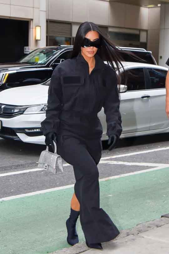 Kim Kardashian glams up in dark jumpsuit during outing in her new pals hometown