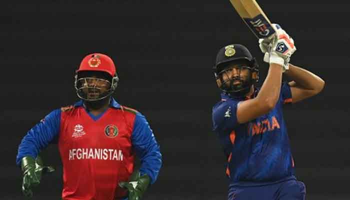 Afghanistan wicketkeeper watches as KL Rahul hits the ball for a boundary. Photo: BCCI
