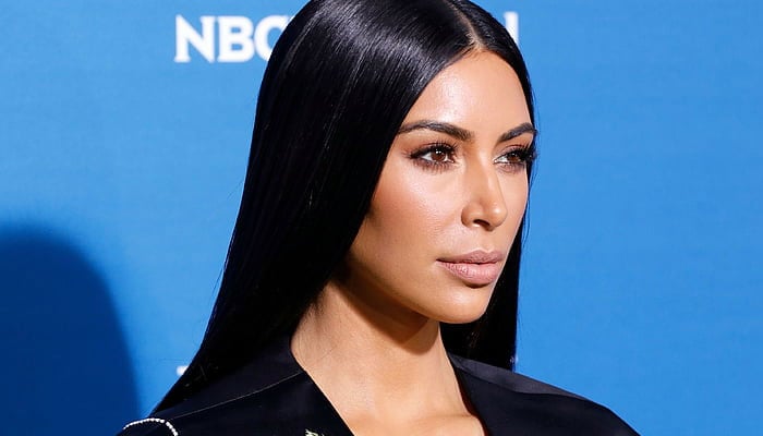 Kim Kardashian sizzles the cozy nigh-out look in thigh-high boots