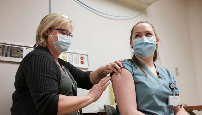 Canadas two provinces said they will not force their hospitals to get their employees vaccinated. File photo