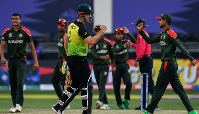 Australias Mitchell Marsh (C) greets Bangladeshs players after the end of the play at ICC menâ€™s Twenty20 World Cup cricket match between Australia and Bangladesh at the Dubai International Cricket Stadium in Dubai on November 4, 2021. — AFP