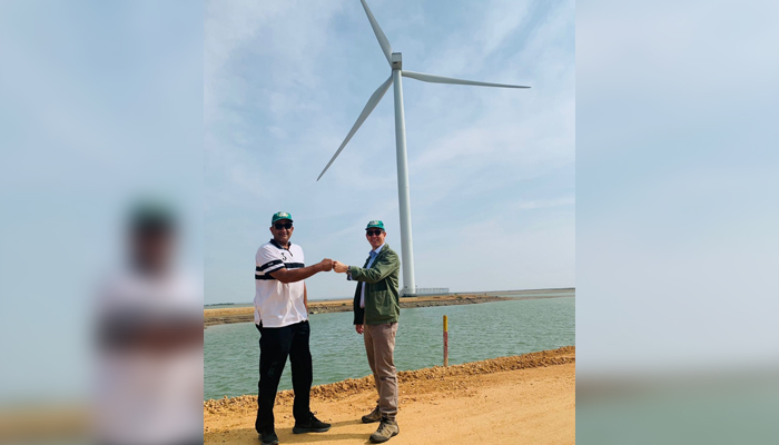 Federal Minister and Adviser to Prime Minister of Pakistan for Climate Change Malik Amin Aslam (L) with UK High Commissioner to Pakistan Dr Christian Turner (R) at the Zephyr Wind in Gharo, which is partly funded with UK capital. —UK High Commission to Pakistan