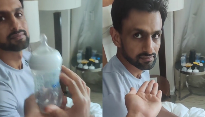 Sania Mirza (whose hand can be seen in the picture) gets a feeder from her husband, Shoaib Malik. — Instagram