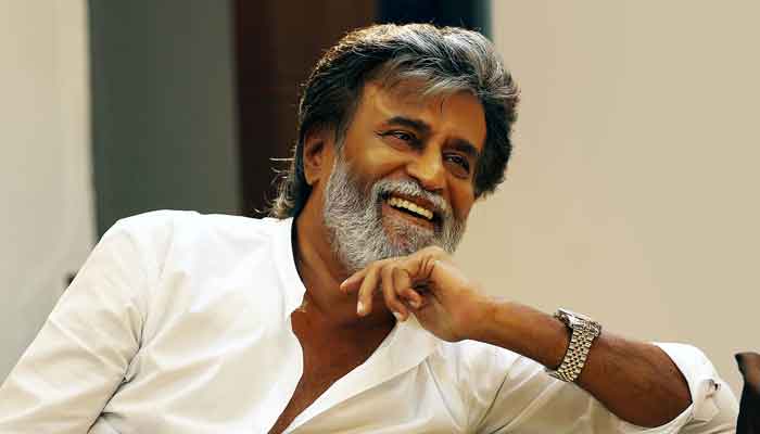 Fans spray milk on posters displaying Rajinikanth ahead of Annaatthes release
