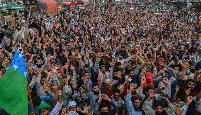 Supporters of the proscribed Tehreek-e-Labbaik Pakistan (TLP) gather in a protest march in Muridke. — AFP/File