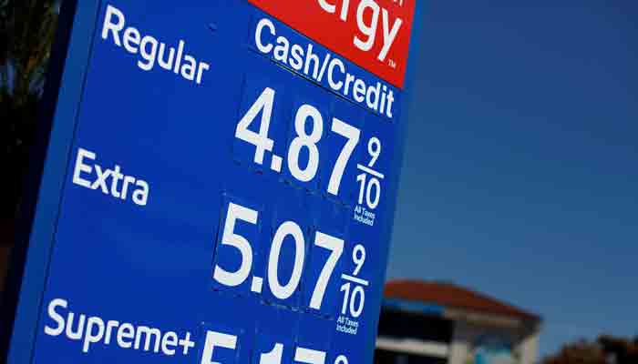 Gas prices grow along with inflation as this sign at a gas station shows in San Diego, California, U.S. November, 9, 2021. -REUTERS