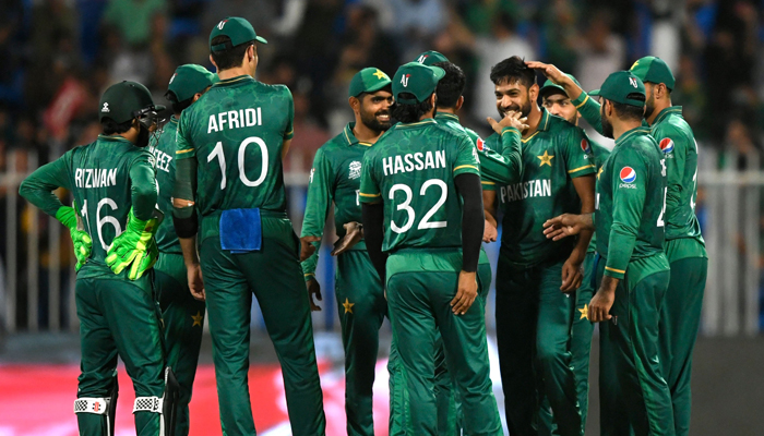 Pakistans cricketers celebrate after the dismissal of Scotlands George Munsey during the ICC Twenty20 World Cup cricket match between Pakistan and Scotland at the Sharjah Cricket Stadium in Sharjah on November 7, 2021. — AFP