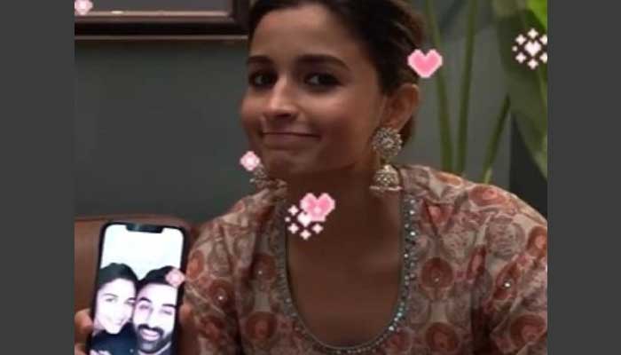 Alia Bhatt shows off adorable screensaver of her cosying up to Ranbir Kapoor