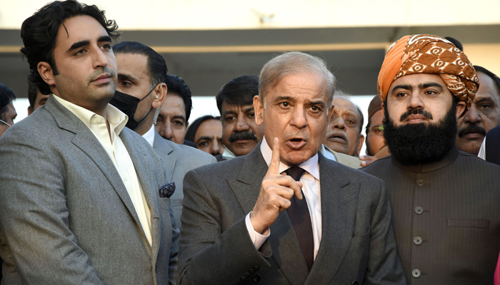 PPP Chairman Bilawal Bhutto (left), Leader of the Opposition in the National Assembly Shahbaz Sharif (centre) and JUI-Fs Maulana Asad Mehmood (right) speaking to media outside Parliament in Islamabad on November 17, 2021. — Online