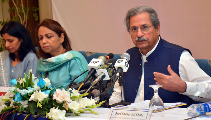Federal Minister for Education and Professional Training Shafqat Mehmood addressing a press conference after chairing the 33rd Inter-Provincial Education Ministers Conference in Karachi on November 18, 2021. — PID