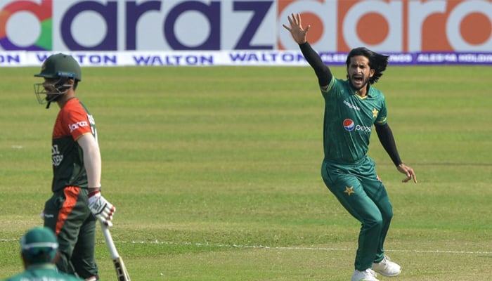 Pakistan´s Hasan Ali (R) celebrates dismissing Bangladesh´s Mohammad Naim during the first Twenty20 international cricket match between Bangladesh and Pakistan at the Sher-e-Bangla National Cricket Stadium in Dhaka on November 19, 2021. — AFP