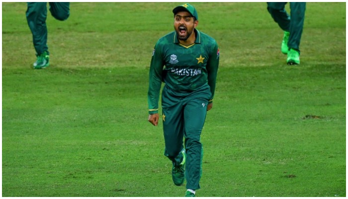 Pakistani cricket captain Babar Azam cheers during a match during the Mens T20 World Cup 2021 — AFP