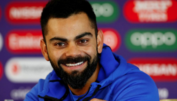 Indian cricket skipper Virat Kohli flashes a smile — Reuters