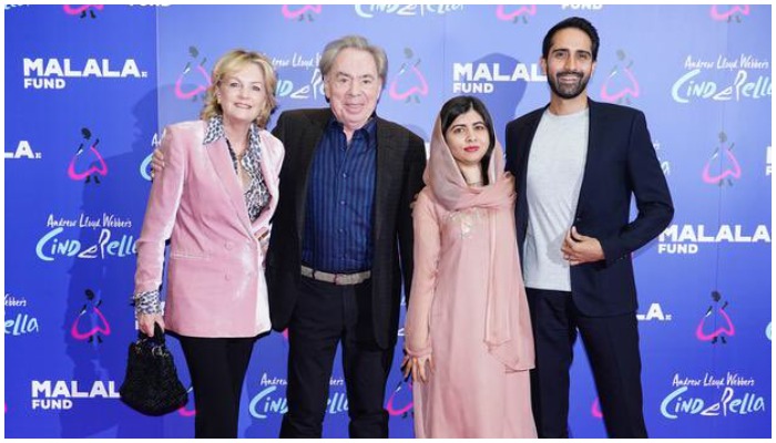 Malala and Asser pose for a picture beside stage musical impresario Andrew Lloyd Webber.