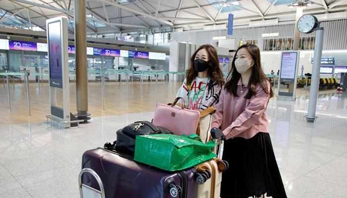 Penggemar Korea Selatan pergi ke luar negeri untuk menyaksikan konser BTS pertama sejak pandemi