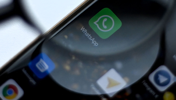 WhatsApp messenger logo is pictured on a phone screen in Moscow on August 26, 2021. — AFP/File