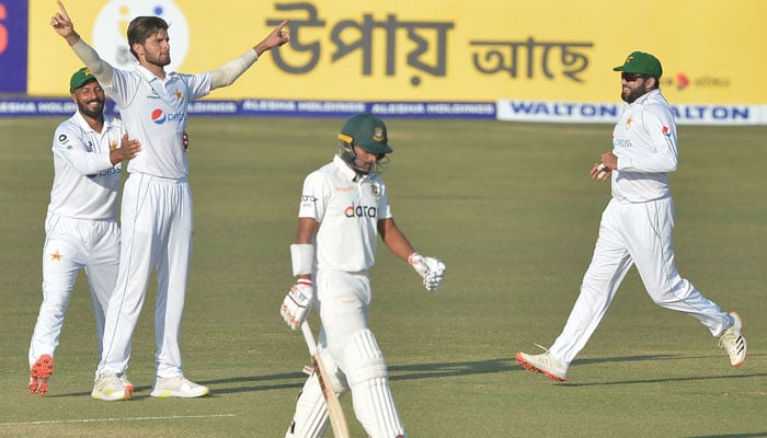 Pakistans Shaheen Shah Afridi (2L) celebrates with teammates after the dismissal of Bangladeshs Najmul Hossain Shanto during the third day of the first Test cricket match between Bangladesh and Pakistan at the Zahur Ahmed Chowdhury Stadium in Chittagong on November 28, 2021. — Photo by Munir Uz Zaman/AFP