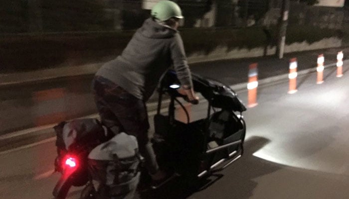 Green Party MP Julie Anne Genter rides a bicyle to the hospital while in labour, in Wellington, New Zealand, November 28, 2021, in this picture obtained from social media. — Julie Anne Genter/Facebook/via Reuters