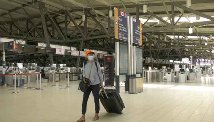 A traveller walks through the Ottawa International Airport Monday, July 5, 2021, as quarantine restrictions for fully vaccinated Canadians returning from international travel are eased. Photo: CTV News Ottawa