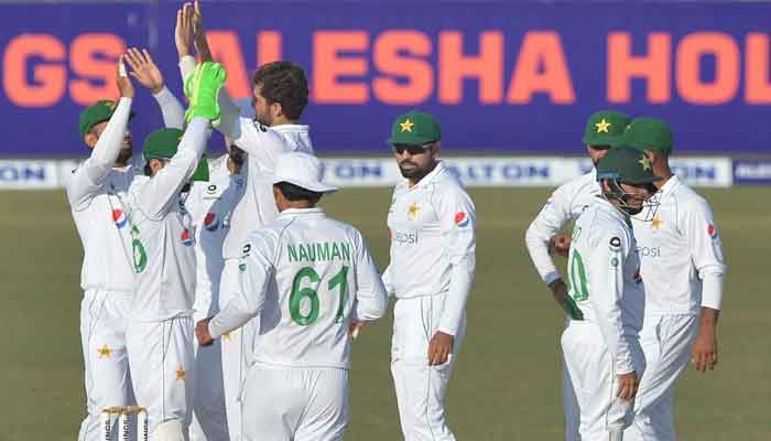 Shahaeen Afridi celebrates after picking up two wickets in his third over. Photo: AFP