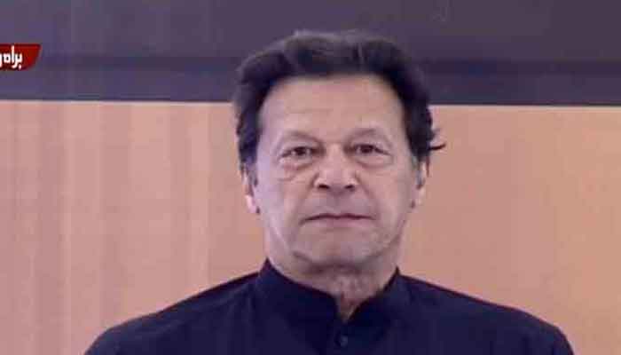 Prime Minister Imran Khan speaks at Al-Qadir University in Jhelum. Photo: Geo News screengrab