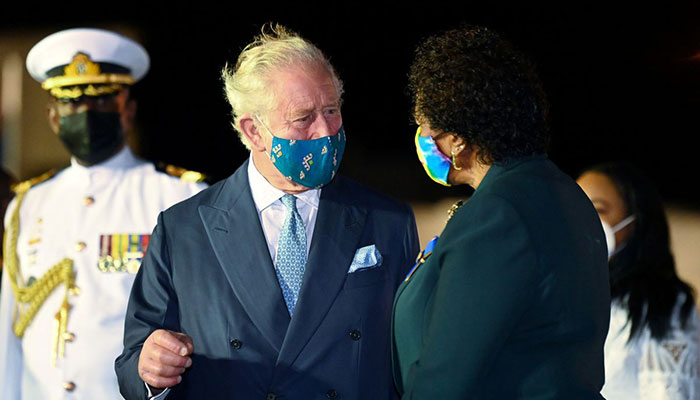 Britains Prince Charles speaks with Barbados President-elect Sandra Mason as he arrives at Grantley Adams Airport to take part in events to mark the Caribbean islands transition to a birth of a new republic. Photo: Reuters