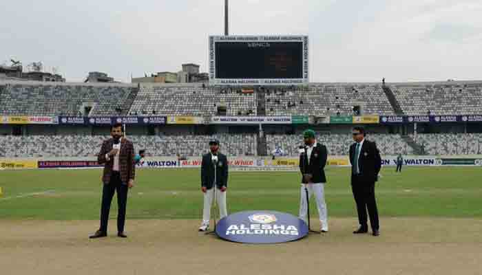 Captain of Pakistan and Bangladesh during toss for the second Test match.