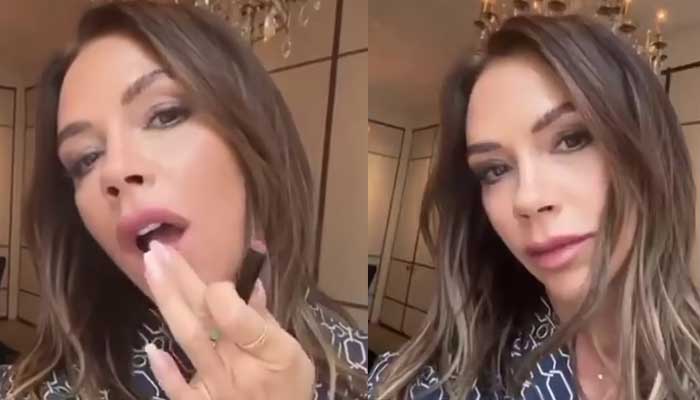 Victoria Beckham shows off her flawless makeup look with hint of the pink