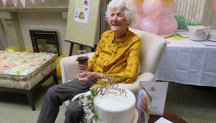Eileen Ash attributed her long life to being happy, smiling a lot, red wine and keeping fit with yoga. Photo: Courtesy BBC via Castle Meadow Care