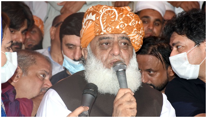 President Pakistan Democratic Movement (PDM) Maulana Fazlur Rehman talking with media persons at the protest of journalists in front of the Parliament House in Islamabad — ONLINE/ Sultan Bashir
